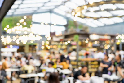 Defocused image of crowd at restaurant