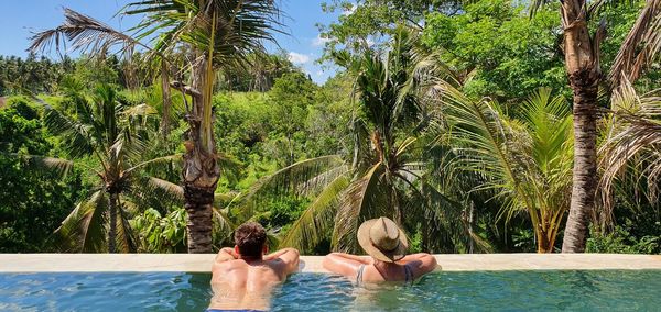 People relaxing in swimming pool