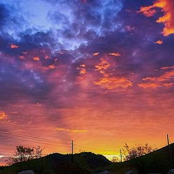 Scenic view of dramatic sky during sunset