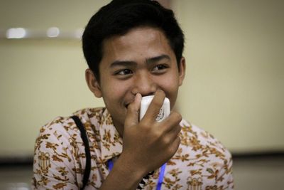 Portrait of man smoking cigarette