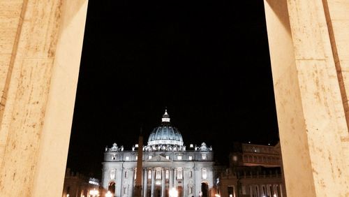 Low angle view of illuminated building at night