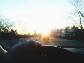 Sunset seen through train windshield