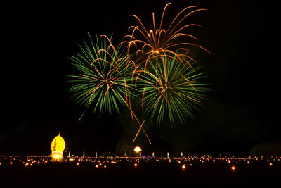 Firework display at night