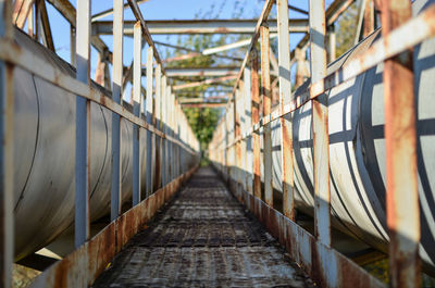 View of footbridge along railings