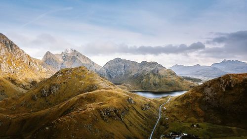 Panoramic view of snowcapped mountains against sky