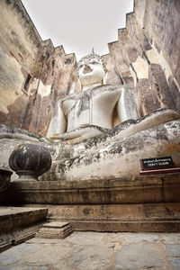 Low angle view of statue of historic building