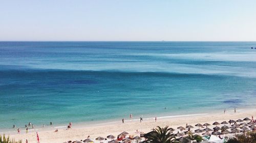 Scenic view of beach against clear sky