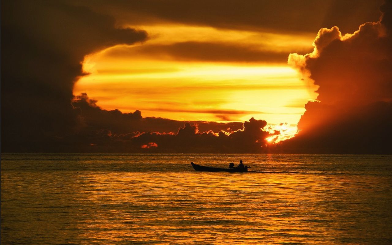 sunset, nautical vessel, transportation, water, mode of transport, boat, sky, orange color, silhouette, waterfront, cloud - sky, sun, scenics, sea, beauty in nature, tranquil scene, reflection, sailing, tranquility