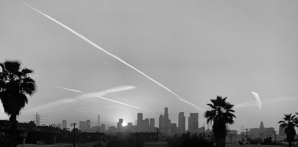 Low angle view of vapor trails in sky