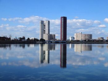 Reflection of buildings in lake