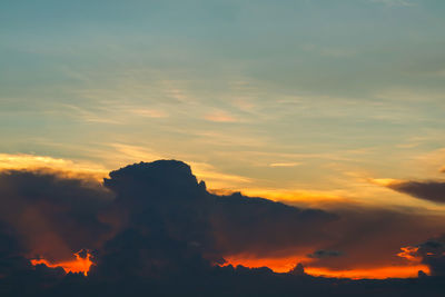 Low angle view of dramatic sky during sunset