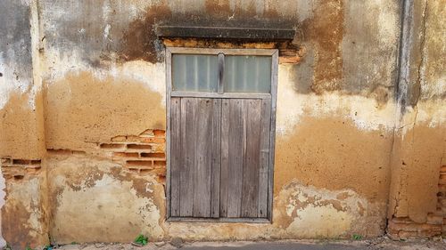 Closed window of old house