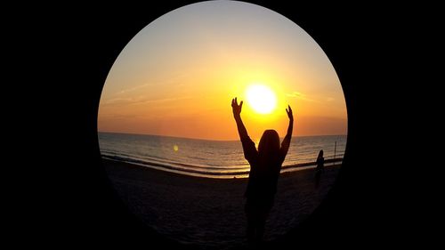 Scenic view of sea at sunset