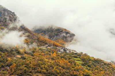 Scenic view of mountains against sky during autumn