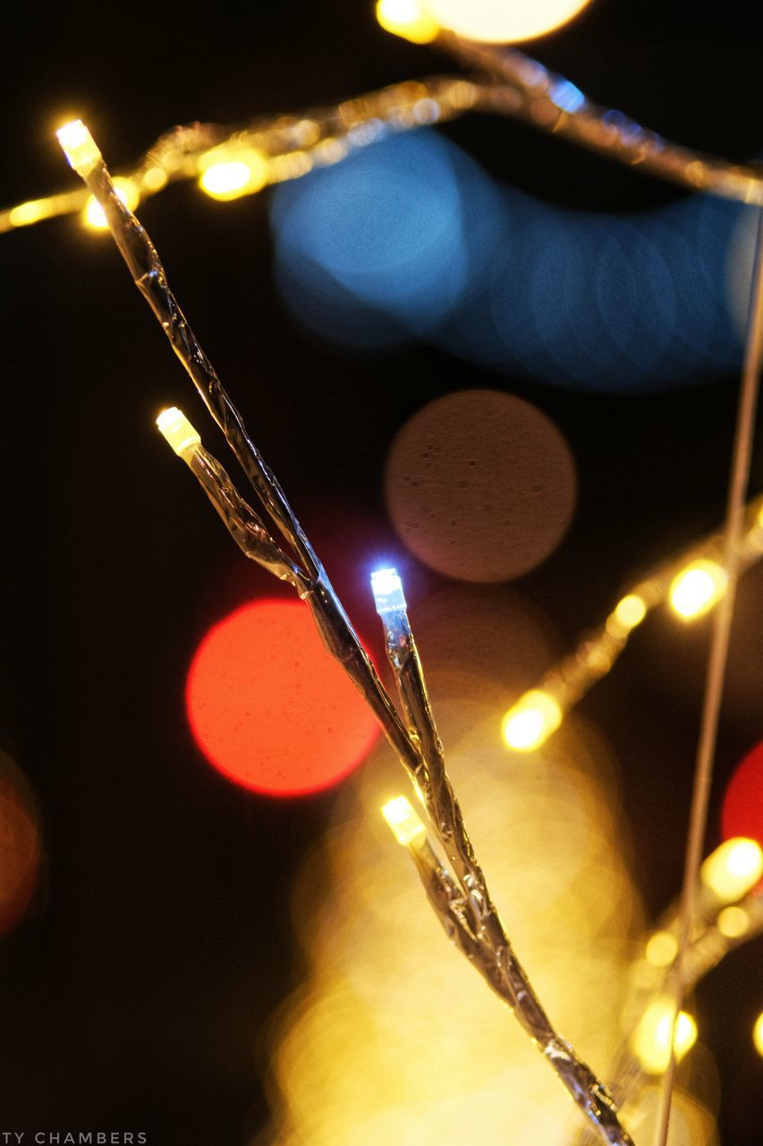 CLOSE-UP OF ILLUMINATED LIGHT PAINTING