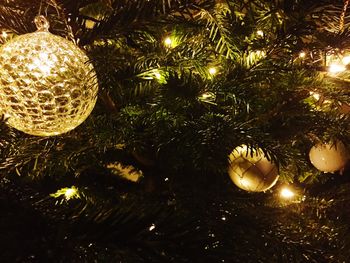 Low angle view of illuminated christmas lights