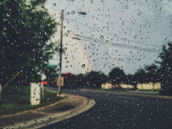 Road seen through wet window