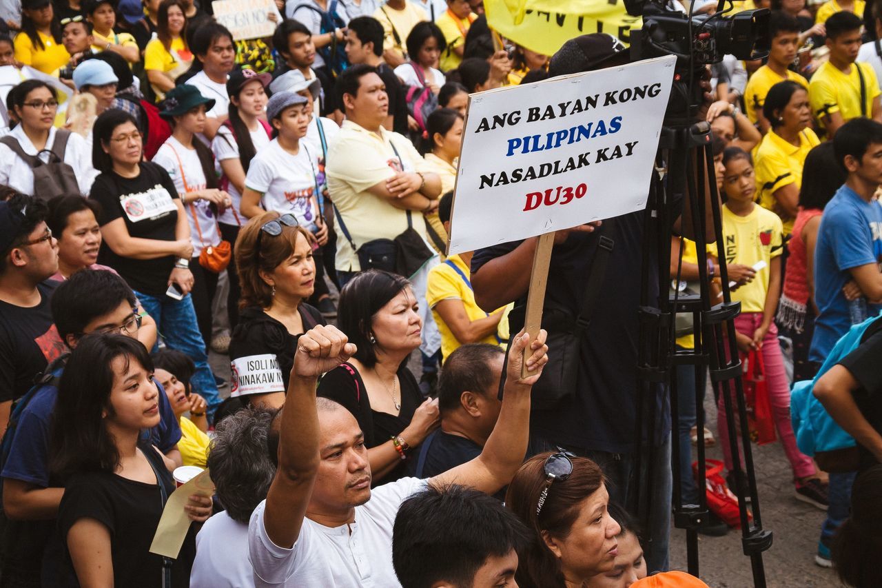 crowd, large group of people, holding, full frame, adults only, men, people, real people, adult, outdoors, togetherness, cheering, day