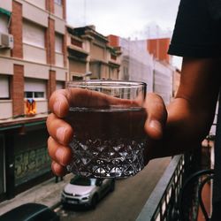 Man holding coffee cup