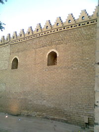 Low angle view of fort against clear sky