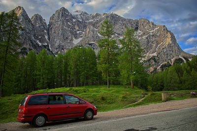 Car on road against mountain range