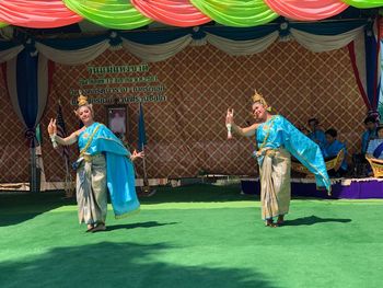 Full length of people in traditional clothing