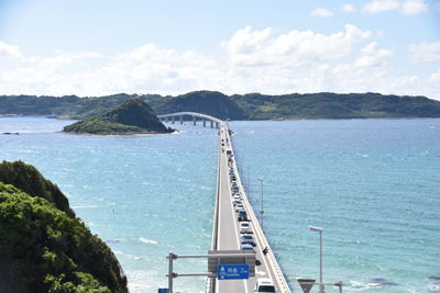 Scenic view of bay against sky. this bridge is called tsunoshima ohhashi .