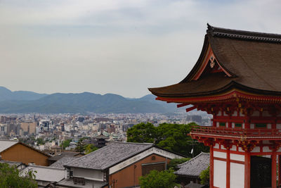 View of buildings in city against sky