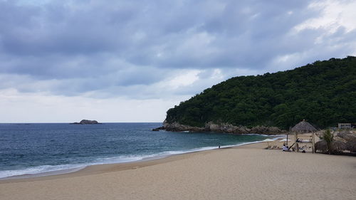 Scenic view of beach against sky