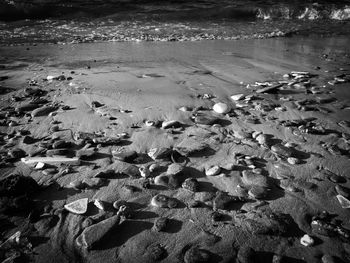 High angle view of pebbles on beach