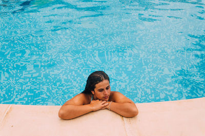 High angle view of woman in swimming pool