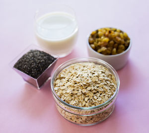 Close-up of oats in container on table