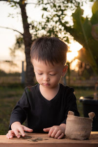 Portrait of cute boy looking at camera