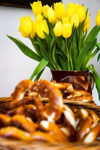 Close-up of yellow flowers on table