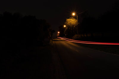 Light trails on street at night