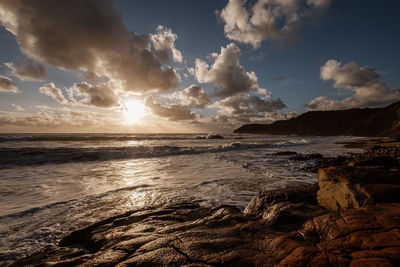 Scenic view of sea against sky during sunset