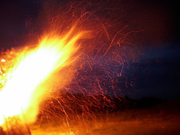 Close-up of firework display at night