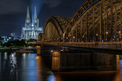 Bridge over river at night