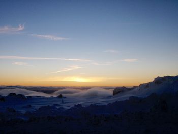 Scenic view of mountains at sunset