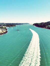 Scenic view of sea against clear blue sky