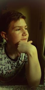 Portrait of young woman at home