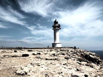 Low angle view of lighthouse against calm sea