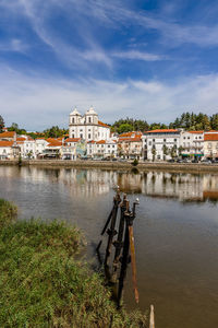 View of river with buildings in background