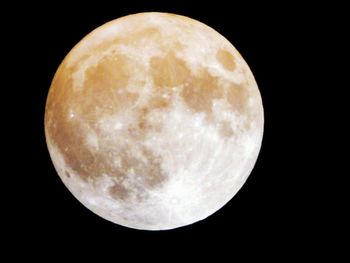 Close-up of moon against clear sky at night