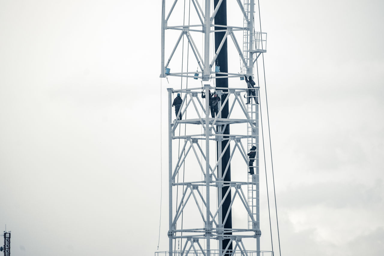 LOW ANGLE VIEW OF ELECTRICITY PYLON