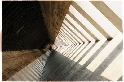 High angle view of people walking on footpath