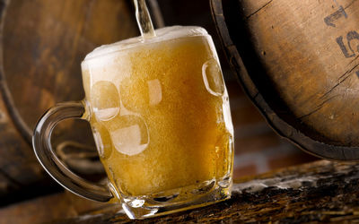Close-up of beer glass on table
