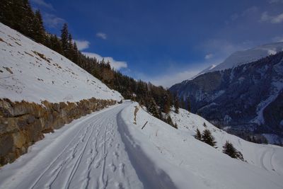 Snow covered mountain against sky