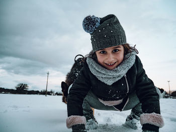 Portrait of smiling girl in snow