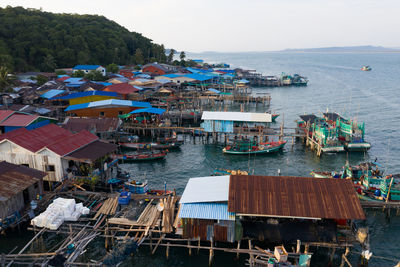 High angle view of boats moored at harbor